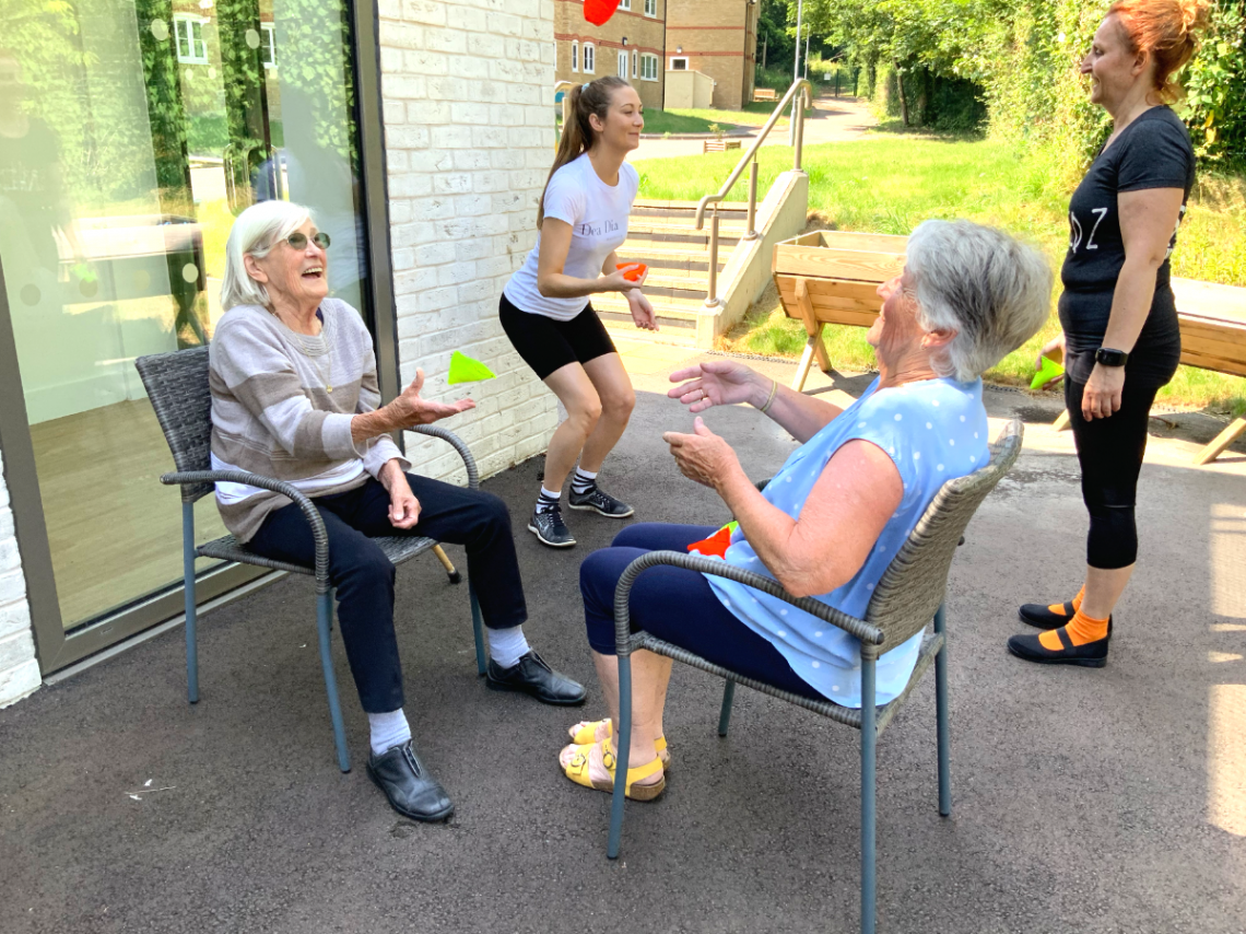 Ladies doing chair aerobics