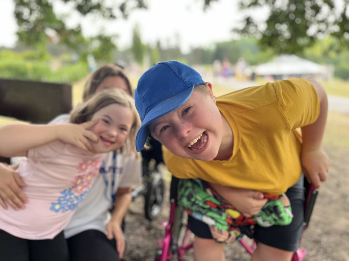 Children smiling at the camera