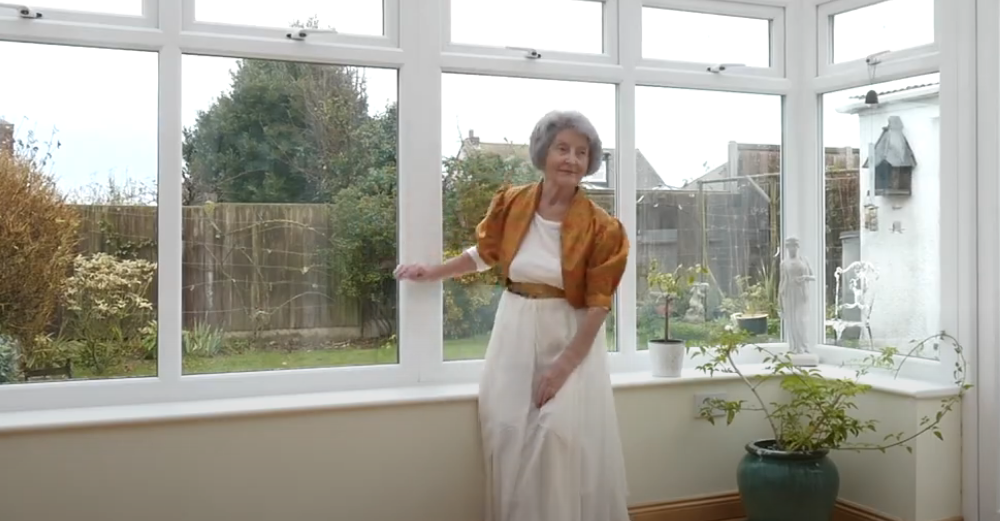 Older lady dancing in her conservatory - Round in Circles Productions CIC 