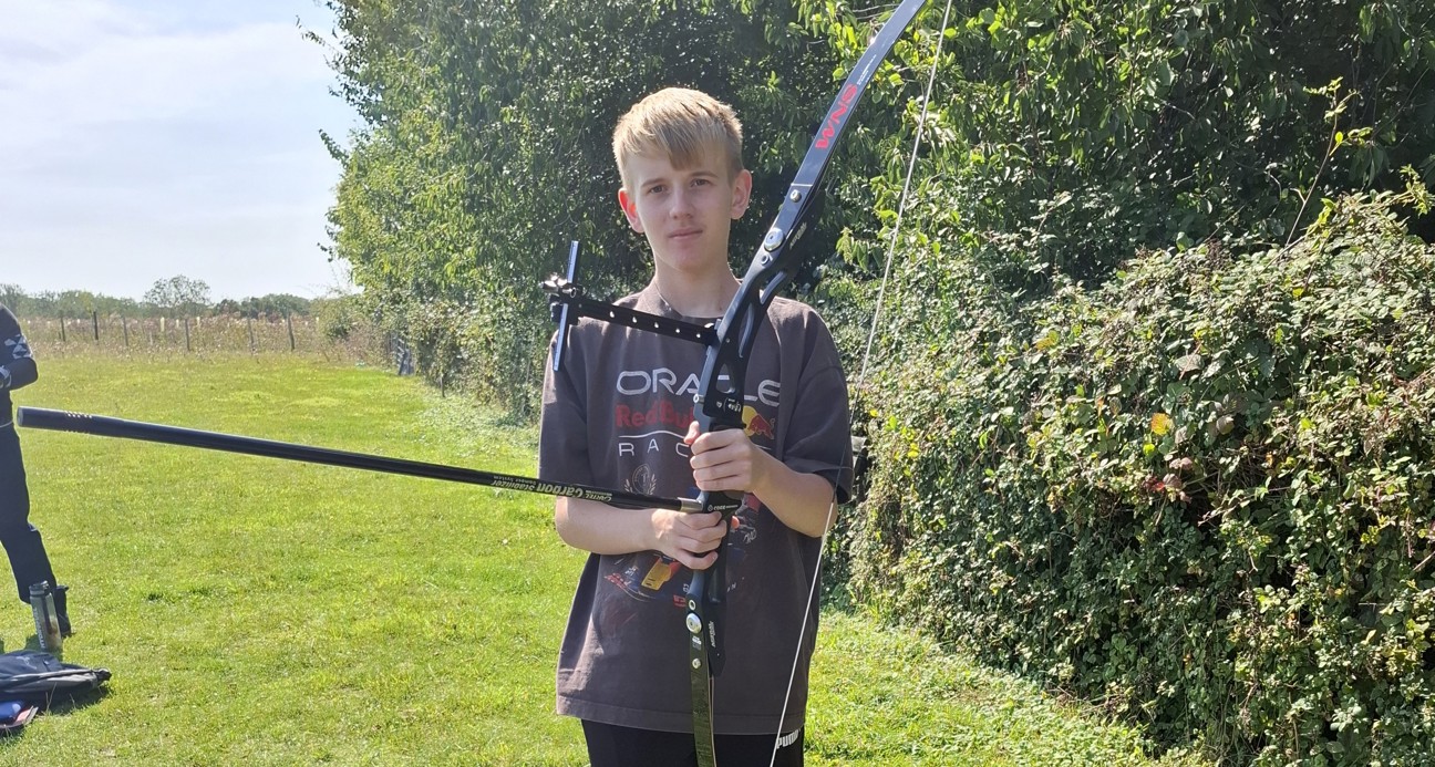 Young carer with archery bow